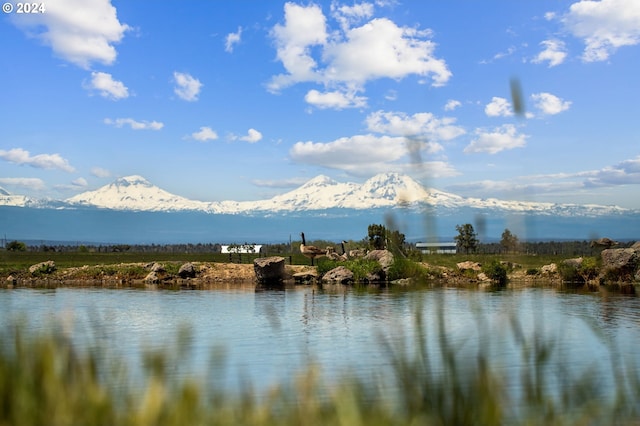 property view of water featuring a mountain view