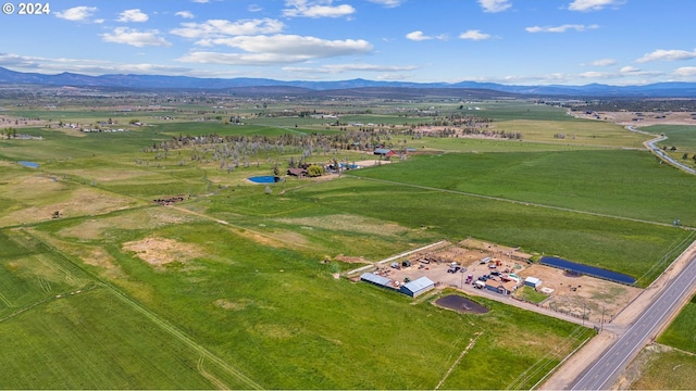 aerial view featuring a mountain view and a rural view