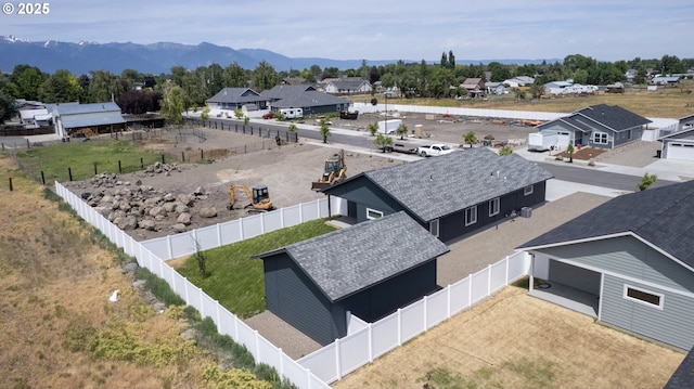 660 E St E, Baker City, OR 97814 - aerial view of residential area featuring a mountain backdrop
