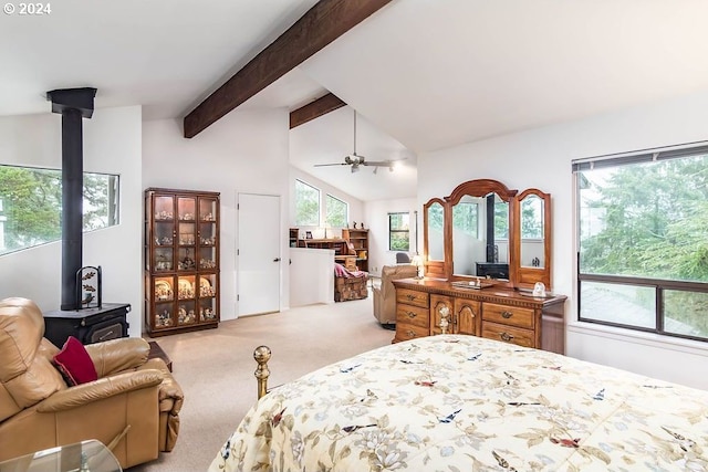 bedroom featuring a wood stove, light carpet, high vaulted ceiling, and beam ceiling