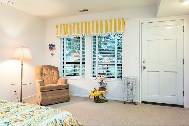 bedroom with light carpet