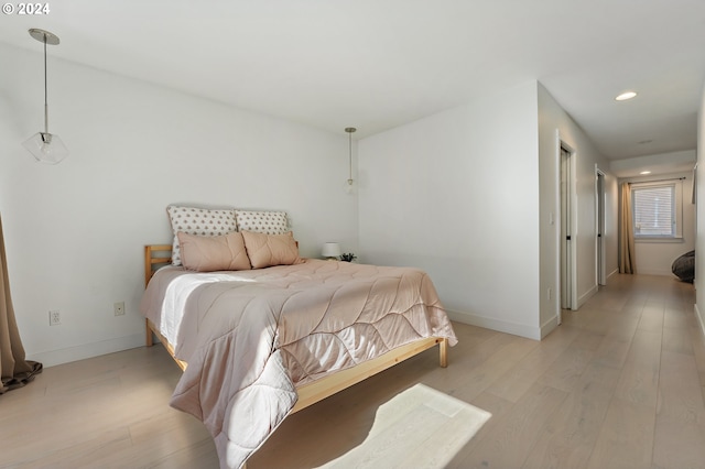 bedroom featuring light hardwood / wood-style flooring