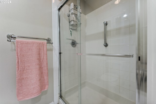 bathroom featuring an enclosed shower