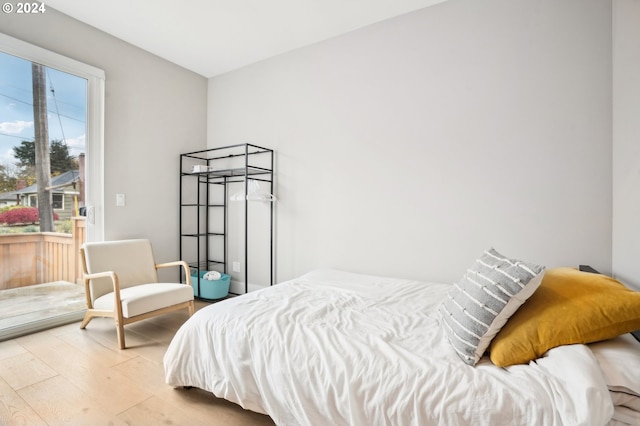 bedroom with light wood-type flooring