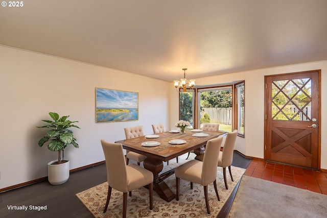 dining space featuring an inviting chandelier