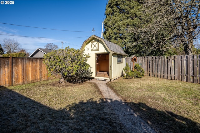 exterior space featuring a front yard and a storage shed