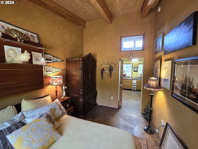 44 Justanother Rd, Goldendale, WA 98620 - bedroom with concrete floors and beamed ceiling