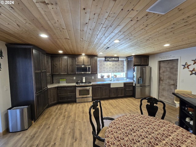 44 Justanother Rd, Goldendale, WA 98620 - kitchen featuring stainless steel appliances, light countertops, dark brown cabinetry, recessed lighting, and a sink