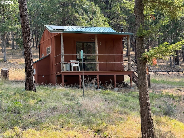 44 Justanother Rd, Goldendale, WA 98620 - view of front of house with metal roof, board and batten siding, and an outdoor structure