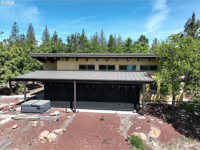 44 Justanother Rd, Goldendale, WA 98620 - view of front of home with a standing seam roof, metal roof, and a sunroom