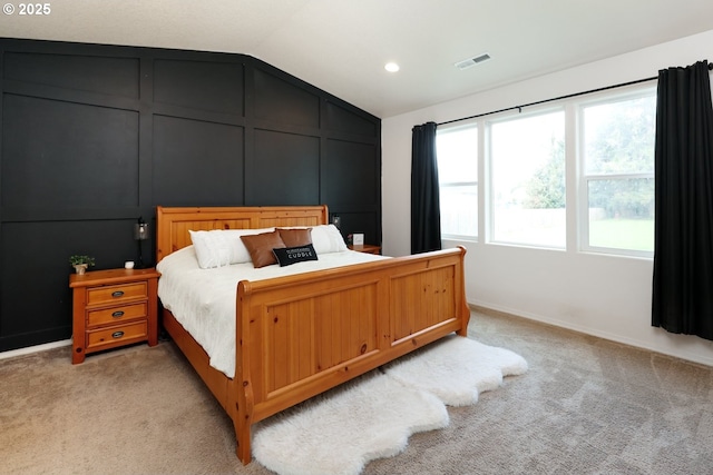 27309 8th St, Junction City, OR 97448 - bedroom featuring light carpet, a decorative wall, lofted ceiling, and visible vents