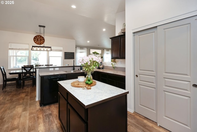 27309 8th St, Junction City, OR 97448 - kitchen featuring a center island, dishwasher, a sink, light countertops, and a peninsula