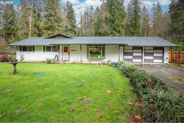 ranch-style house with a front lawn and a garage