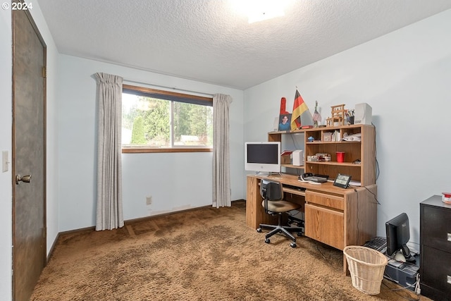 carpeted office with a textured ceiling