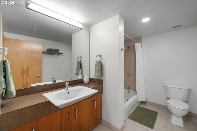 full bathroom featuring vanity, shower / tub combo, toilet, and tile patterned flooring