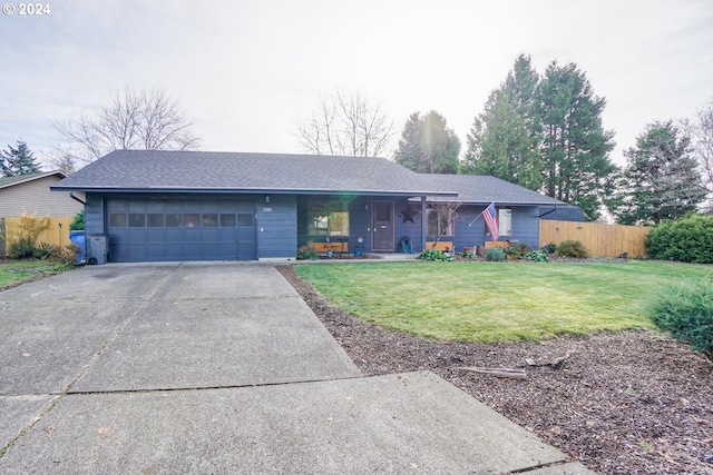 ranch-style home with a porch, a garage, and a front lawn