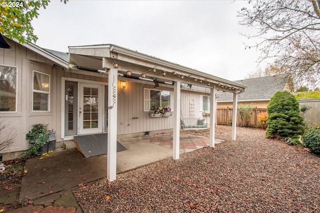 rear view of house with a patio