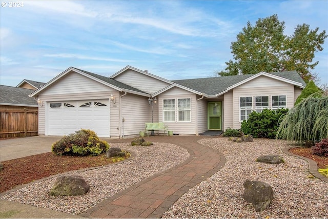 ranch-style home featuring a garage