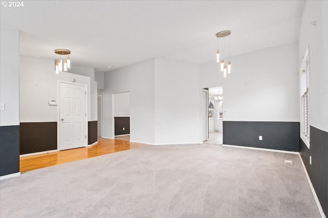 unfurnished living room with carpet floors