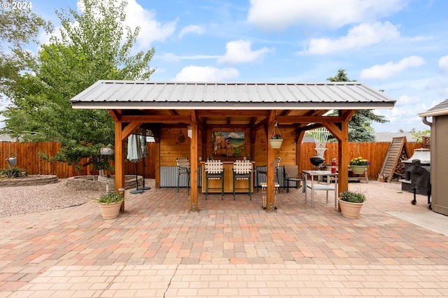 view of patio / terrace with a bar