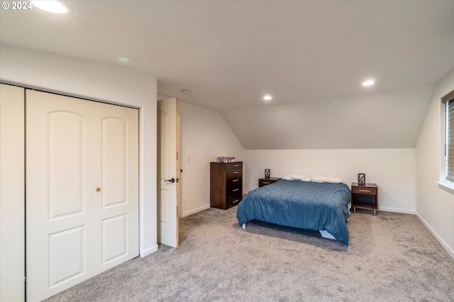 bedroom with light carpet, vaulted ceiling, and recessed lighting