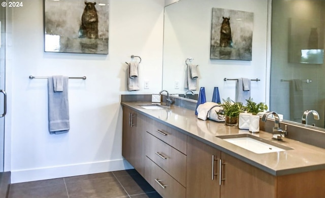 bathroom with vanity, walk in shower, and tile patterned flooring