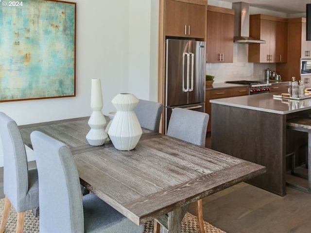 dining room with light wood-type flooring