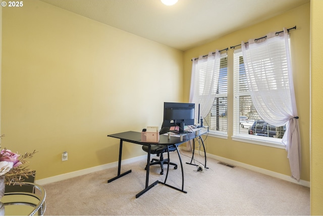 office space featuring light colored carpet