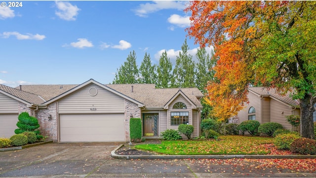 single story home with a garage