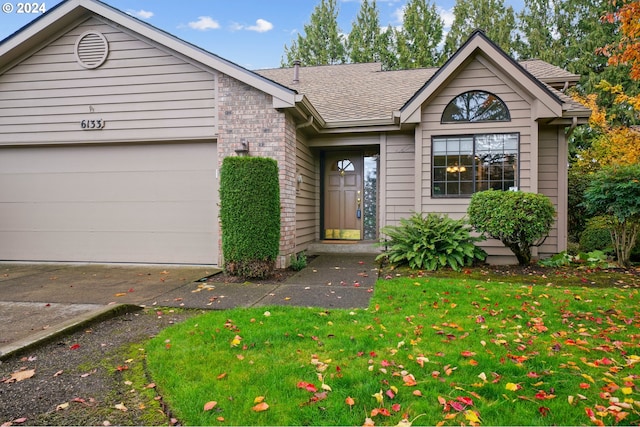 view of front facade with a front yard