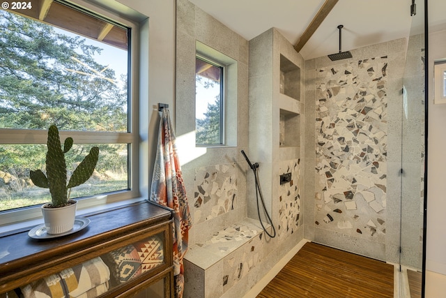 interior space featuring tiled shower and hardwood / wood-style flooring