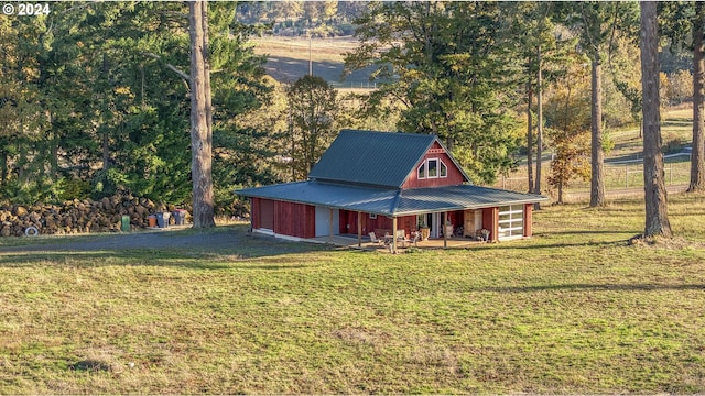 view of outdoor structure with a yard