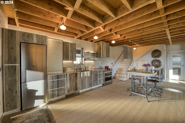 6850 SE Eola Hills Rd, Amity, OR 97101 - kitchen with appliances with stainless steel finishes, a sink, modern cabinets, and healthy amount of natural light