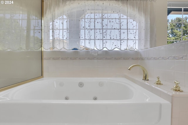 bathroom with a bathing tub