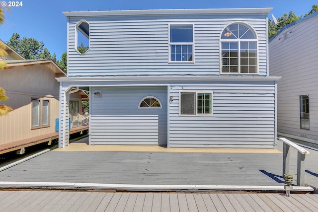 rear view of house with a deck