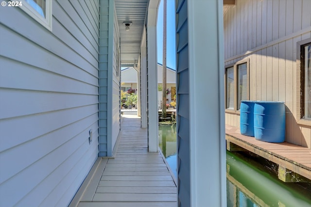 doorway to property featuring a water view