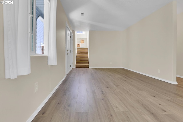 unfurnished room featuring light hardwood / wood-style flooring