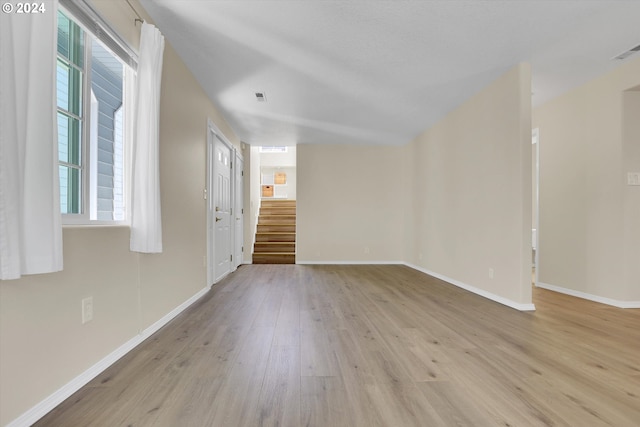 unfurnished room featuring light hardwood / wood-style flooring