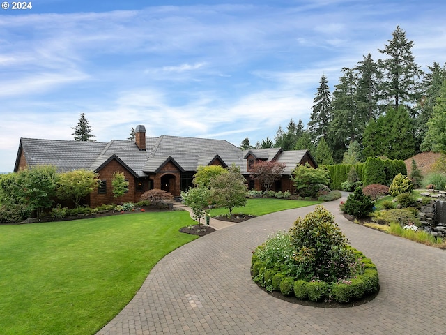 exterior space featuring a front lawn