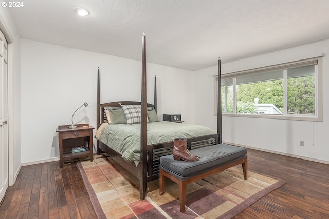 bedroom with wood-type flooring