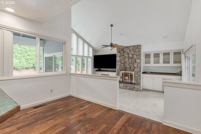 kitchen featuring white cabinets, appliances with stainless steel finishes, a healthy amount of sunlight, and sink