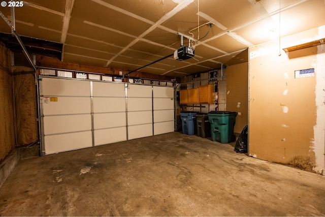garage featuring a garage door opener