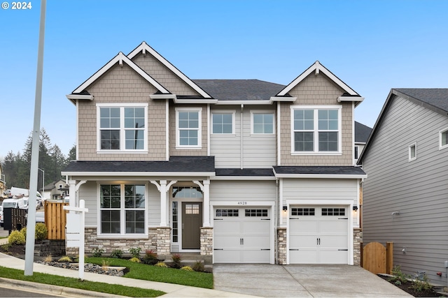 craftsman house featuring a garage