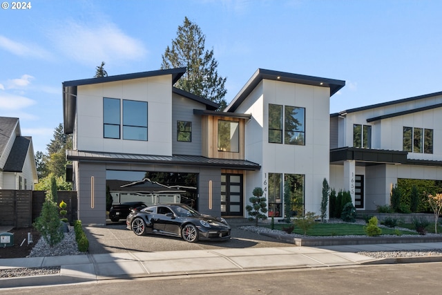 contemporary home with a carport