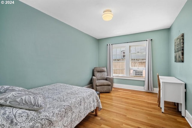 bedroom featuring hardwood / wood-style floors