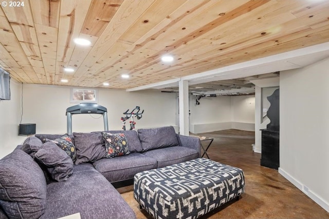 living room featuring wood ceiling and concrete flooring