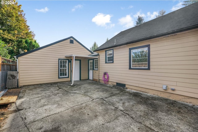 back of house with a patio area