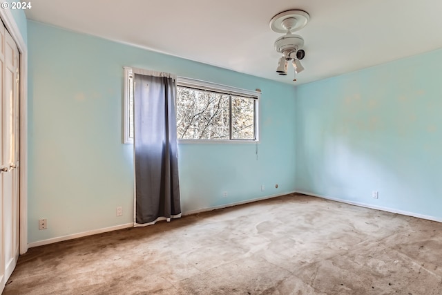 unfurnished room with light colored carpet