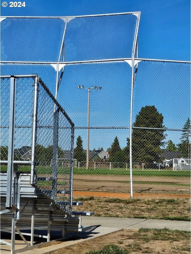 view of property's community featuring fence