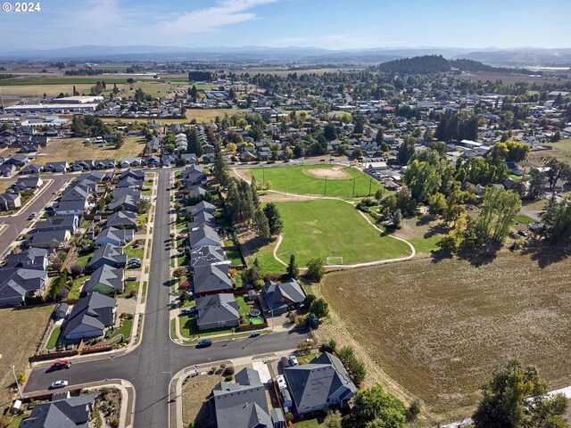 drone / aerial view featuring a mountain view